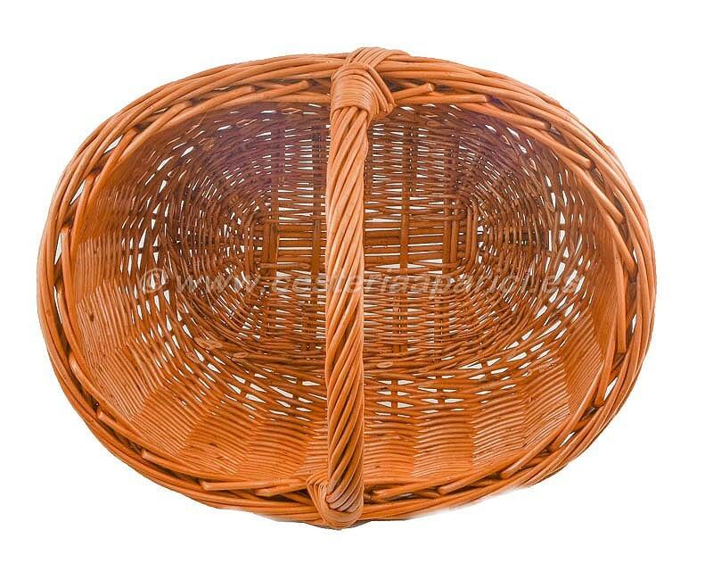Cesta de mimbre ovalada con asa