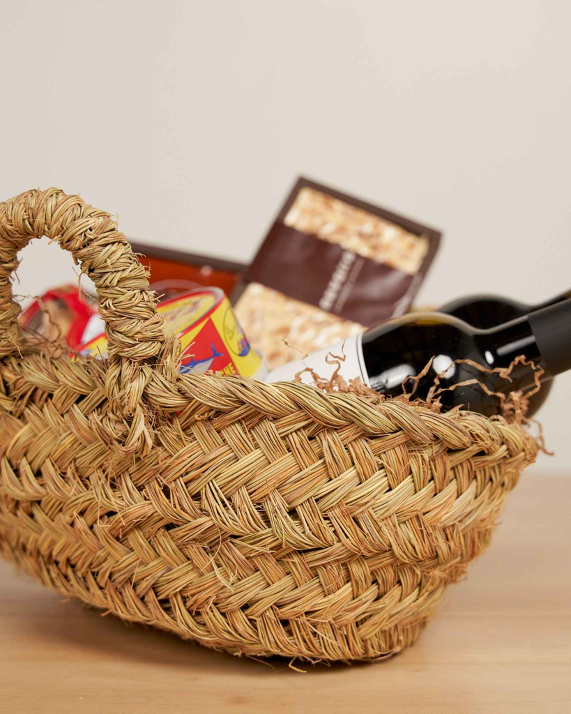 Leñero de esparto oval con asas de esparto